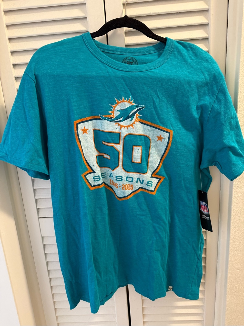 NWT Never worn NFL Miami Dolphins Teal 50 Seasons Graphic T Shirt